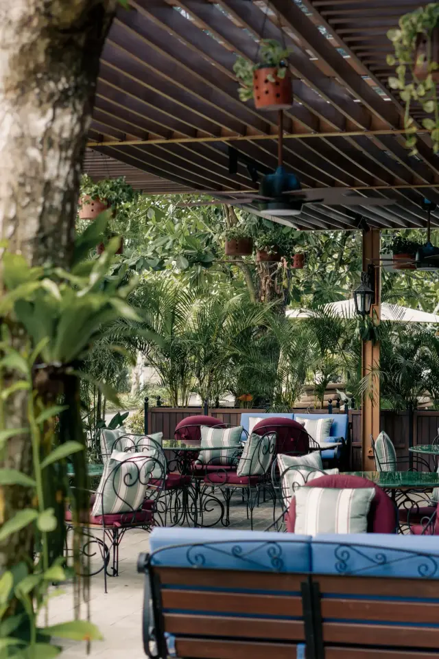 Garden dining area at Jard'Or restaurant in Nusa Dua, Bali